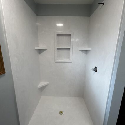 Solid surface shower walls